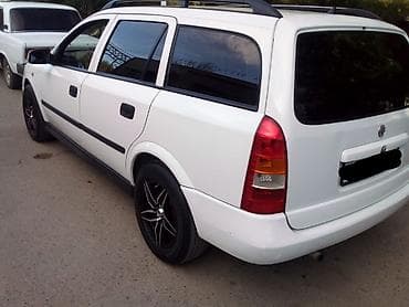 mtz 1025.2 satilir: Opel Astra: 1.6 l | 1999 il 69 km Universal — 3