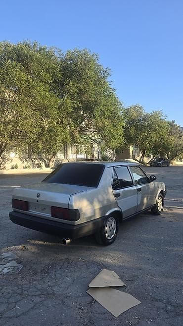 avcarka satılır: Model: Tofaş Şahin (sedan) Rəng: Gümüşü/boz, qara bamperlər Kuzov: 4 — 3