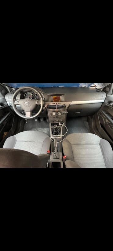 lipa nomrələr: Opel Astra Caravan (Universal) – gümüşü rəng İli 2006 probeq 234000 — 7