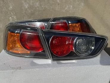 kia optima diffuser: Mitsubishi 2010 il, Orijinal — 2