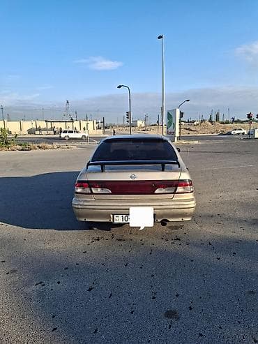 kilid: Nissan Maxima: 3 l | 1999 il Sedan — 2