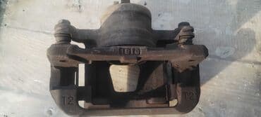 Ötürücü qutuların detalları: Avtomobil üçün ön disk əyləc kaliperi - Tək porşenli, sürüşən bələdçi — 5