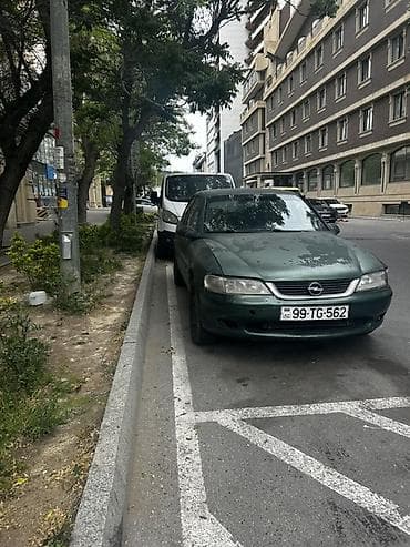 Opel Vectra: 1.6 л | 1996 г. 11111 км Седан — 5