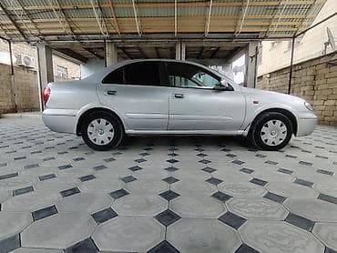 Nissan Sunny: 1.3 л | 2006 г. Седан — 6
