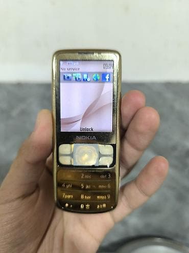 TV və video: Nokia 6700 Slide, < 2 GB Memory Capacity, rəng - Qızılı, Düyməli — 1