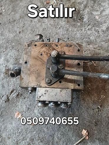 Hidravlik paylayıcı blok (manifold) – mexaniki qollarla idarə olunan