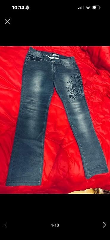 Tünd göy rəngli qadın cins şalvarı. Bu cins şalvarın sol yuxarı