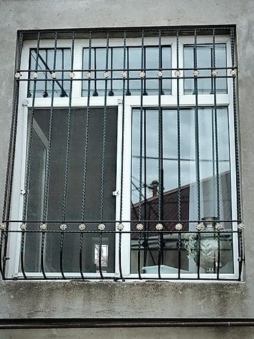 Dəmir pəncərə barmaqlıqları – dekorativ və təhlükəsizlik həlli -