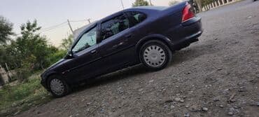 запчасти на опель вектра: Tünd göy rəngdə olan Opel Vectra sedanı. Bu avtomobil rahat və — 1