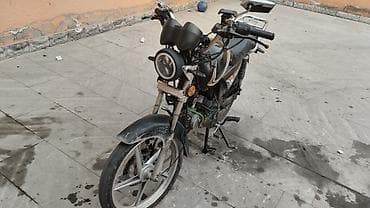 vaz 2107 2010: MX49 yol motosikleti - Model: MX49 - Rəng: qara, gümüş və narıncı — 2