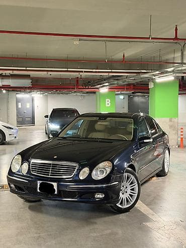 07 disk: Mercedes-Benz E 320: 3.2 l | Sedan — 5