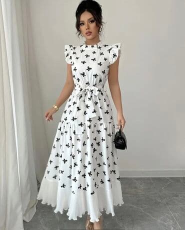 cicekli don: Ağ rəngdə, qara çiçək naxışlı, uzunqol qadın midi donu. Donun V — 15