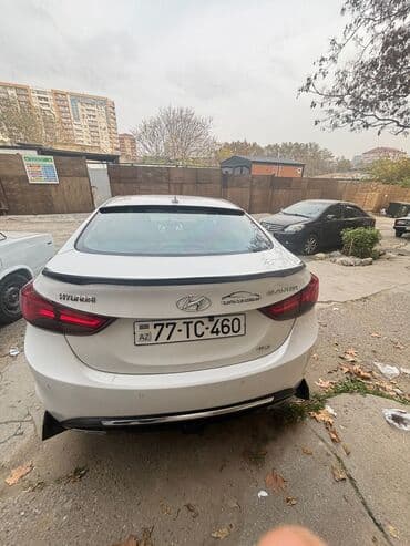 aston martin vanquish 5.9 at: Hyundai Elantra: 1.8 l | 2011 il Sedan — 3