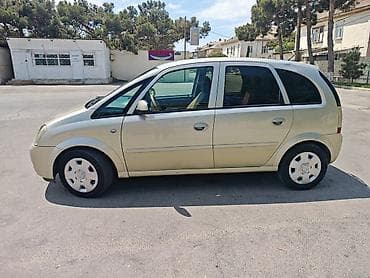 mini cps: Opel Meriva: 1.3 l | 2006 il 500000 km Van/Minivan — 4