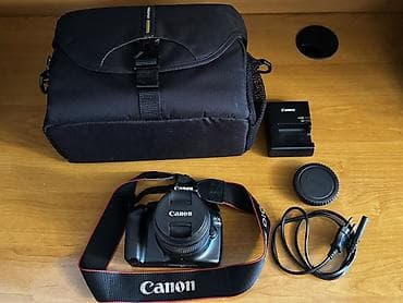 Qiymətə tam komplektasiyalı Canon EOS 1100D (batareya şarj cihazı