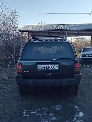qezali avtomobil: Jeep Grand Cherokee: 4 l | 1993 il Ofrouder/SUV — 10