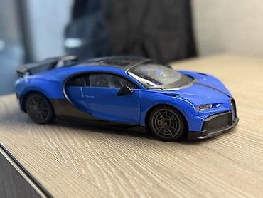 pultlu mawin: Məhsul: Radiouidarəolunan (RC) idman avtomobili modeli – mavi/qara — 2