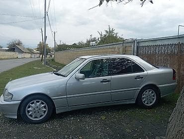 250 cc motor: Mercedes-Benz C-Class sedan (W280) – gümüşü rəng. Xüsusiyyətlər: - — 2
