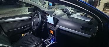 turbo az opel astra 2015: Opel Astra H – mavi rəng, sedan/hetçbek kuzov (ön görünüş). Nömrə — 3