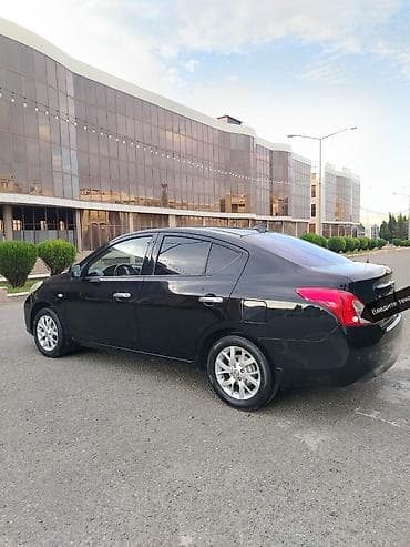 tesla model s: Nissan Sunny: 1.3 l | 2012 il Sedan — 6