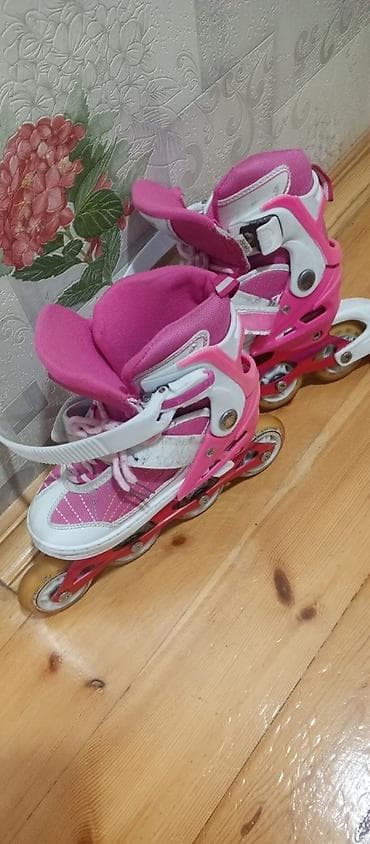 Roliklər: Tənzimlənən uşaq inline konkisi (roller). 32-35 - Rəng: çəhrayı-ağ - — 2