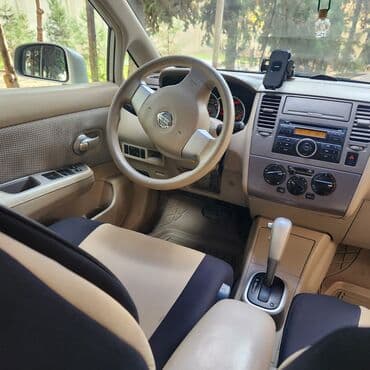 kvadrasikl satılır: Nissan Tiida sedan – gümüşü rəng Texniki xüsusiyyətlər və təchizat: - — 7