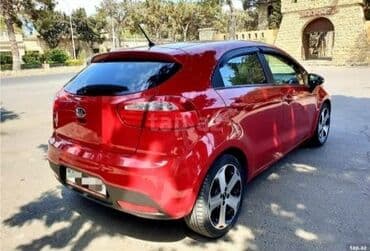 ilkin odenis 2000 azn olan masinlar: Kia Rio hatchback – parlaq qırmızı rəngli, kompakt və şəhər üçün ideal — 4