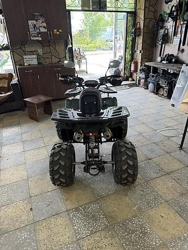 atv maşın: ATV kross – 4 təkərli, kamuflyaj gövdə rəngi Xüsusiyyətlər: - Güclü — 4