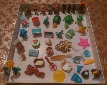 lego bionicle konstruktorları: Müxtəlif formalı və rəngli oyuncaq fiqurların kolleksiyası. Bura — 1