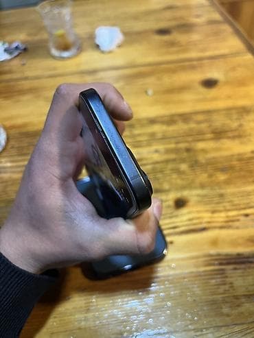 1 tr harddisk: IPhone 15, 128 GB, Midnight, Face ID — 6