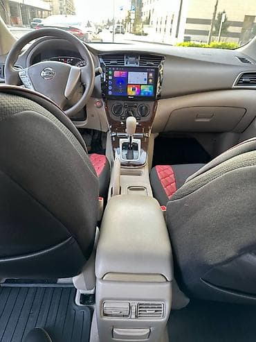 Nissan Sentra: 1.6 л | 2014 г. Седан — 9