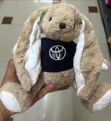 toy donlarl: Loqolu mişkalar satılır. Ağ rəngli, yumşaq oyuncaq ayı, üzərində sarı — 4