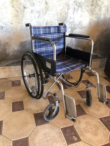 Manual əlil arabası - Konstruksiya: möhkəm metal çərçivə, xrom rəngli