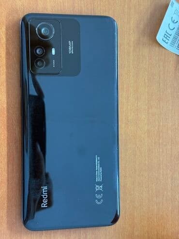 redmi 12 ekran: Xiaomi Redmi smartfon - Arxa qapaqda “Redmi” loqosu, qara rəngli — 2