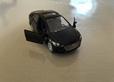 заказать модель машины: Ağ rəngdə metal die-cast sedan oyuncağı (miqyaslı model) - Material — 10