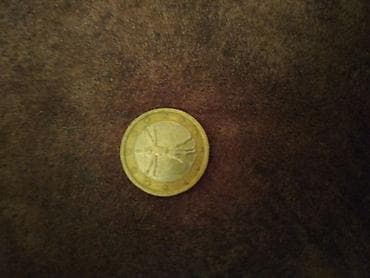 Məhsul: 1 avro sikkəsi Təsvir: - Nominal: 1 EUR - Material: iki