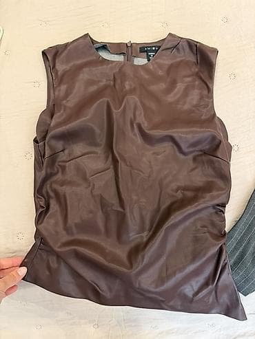 salvar qadin: - Məhsul: Geyim dəsti – 3 ədəd şalvar + 1 ədəd ətək - Tərkib: 1) Bej — 5