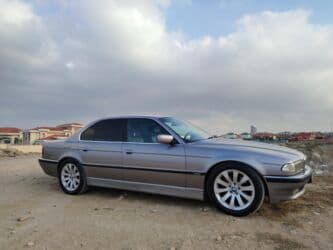 mersedes c 230: BMW 735: 3.5 l | 1998 il Sedan — 2