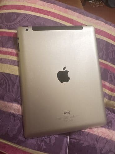 Apple iPad planşet Xüsusiyyətlər: - Gümüşü alüminium arxa gövdə, qara