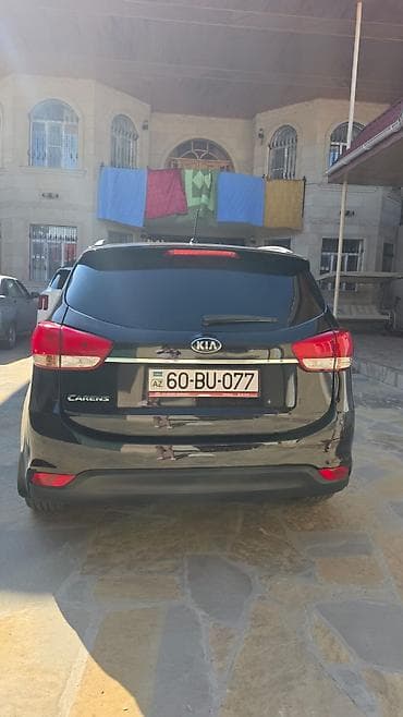 mini cps: Kia Carens (qara rəng), ili 2016, 7 yerlik rahat ailə miniveni — 4