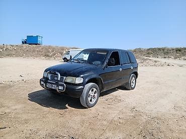 Kia Sportage: 1.7 l | 1996 il Ofrouder/SUV — 10