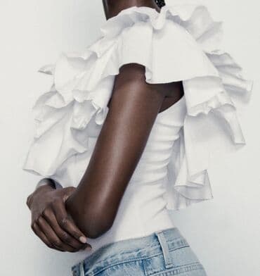 ağ çanta: Zara body bluz tezedir geyilmeyib 
L razmerdir — 1