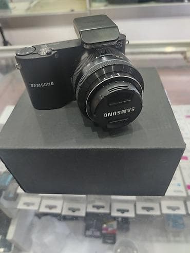 isti: Samsung NX1000 hibrid fotoaparat dəsti - Gövdə: Samsung NX1000 (APS‑C — 4