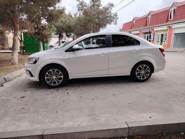 opel astra h 1.3 turbo: Chevrolet Aveo sedan – ağ rəng Model xüsusiyyətləri: - Korpus: 4 — 2