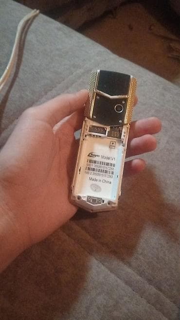 qaz paneli: Lüks dizaynlı düyməli mobil telefon – Changep Model: V1 — 2