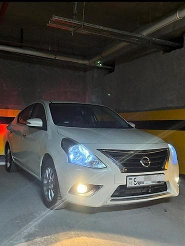 мото: Nissan Sunny: 1.5 л | 2014 г. Седан — 2