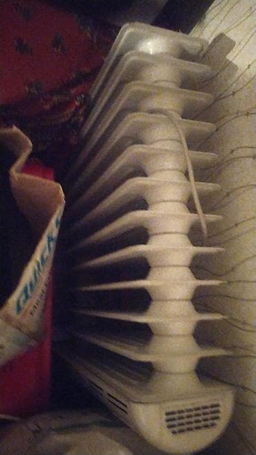 w210 radiator: Yağlı radiator – elektriklə işləyən portativ isitmə cihazı — 2