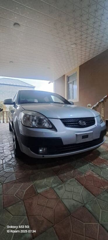 автомобиль фольксваген поло: Kia Rio: 1.4 л | 2006 г. Хэтчбэк — 1