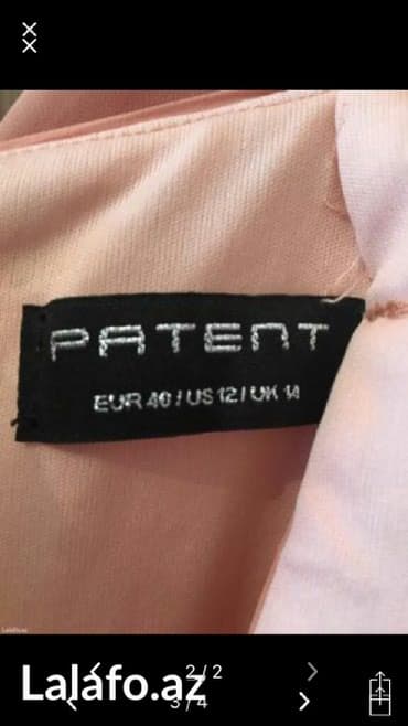 ikinci əl uşaq əşyaları: Bir defe geyinilib 40 razmer cox zerif paltardi Sahil ticaret — 2