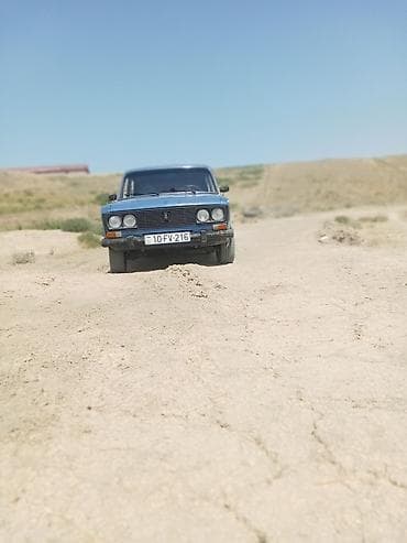 vaz guzguleri: VAZ 2106, mavi rəng, sedan kuzov. Texniki xüsusiyyətlər: - Arxa — 2